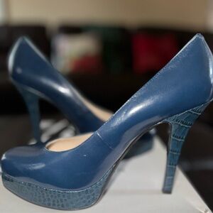 Nine West anyone? These beautiful blue heels were only worn once!